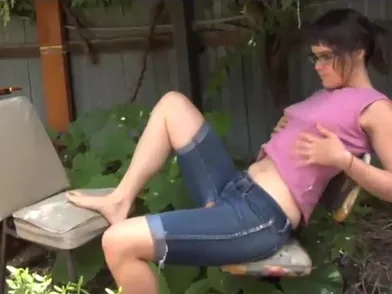 Brunette babe in glasses playng hairy pussy